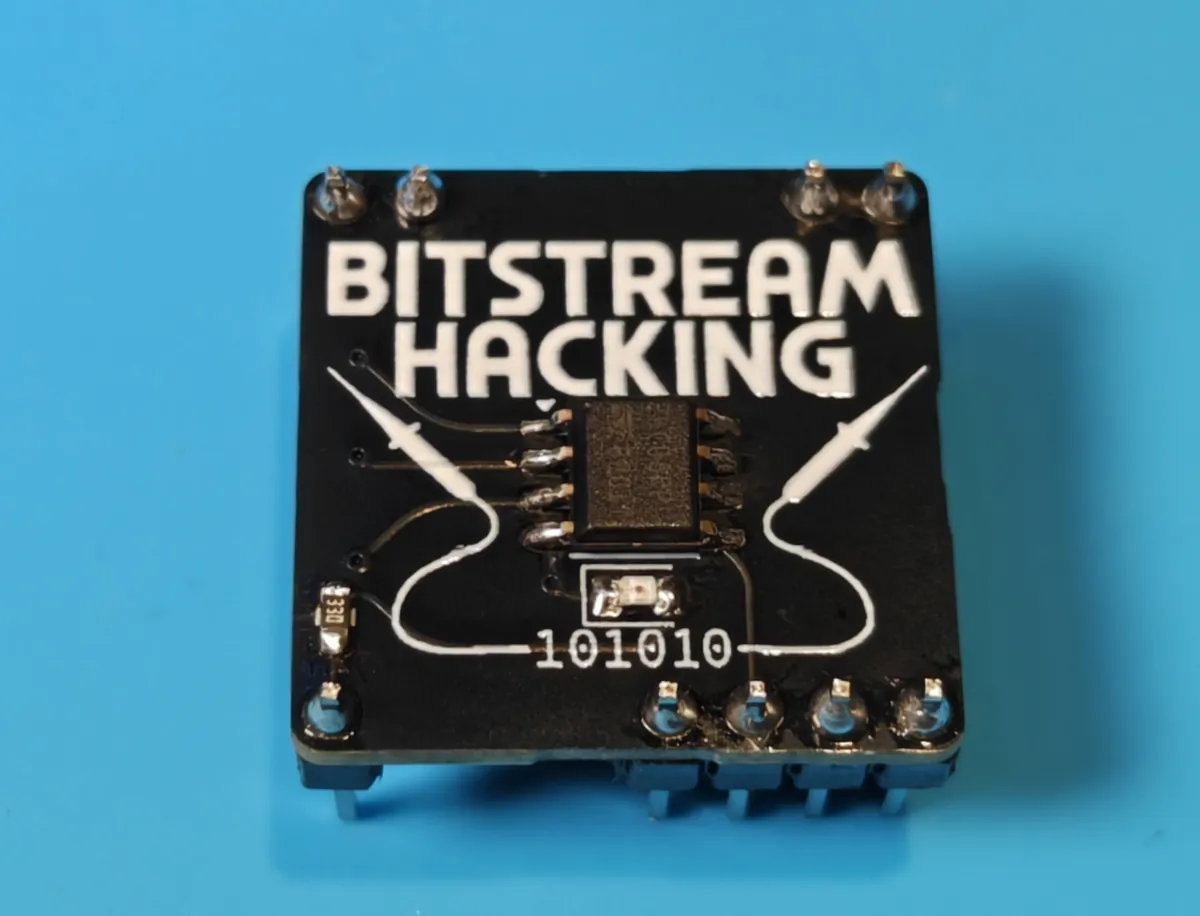 The finished Level 2 minibadge with LED, resistor, EEPROM and headers