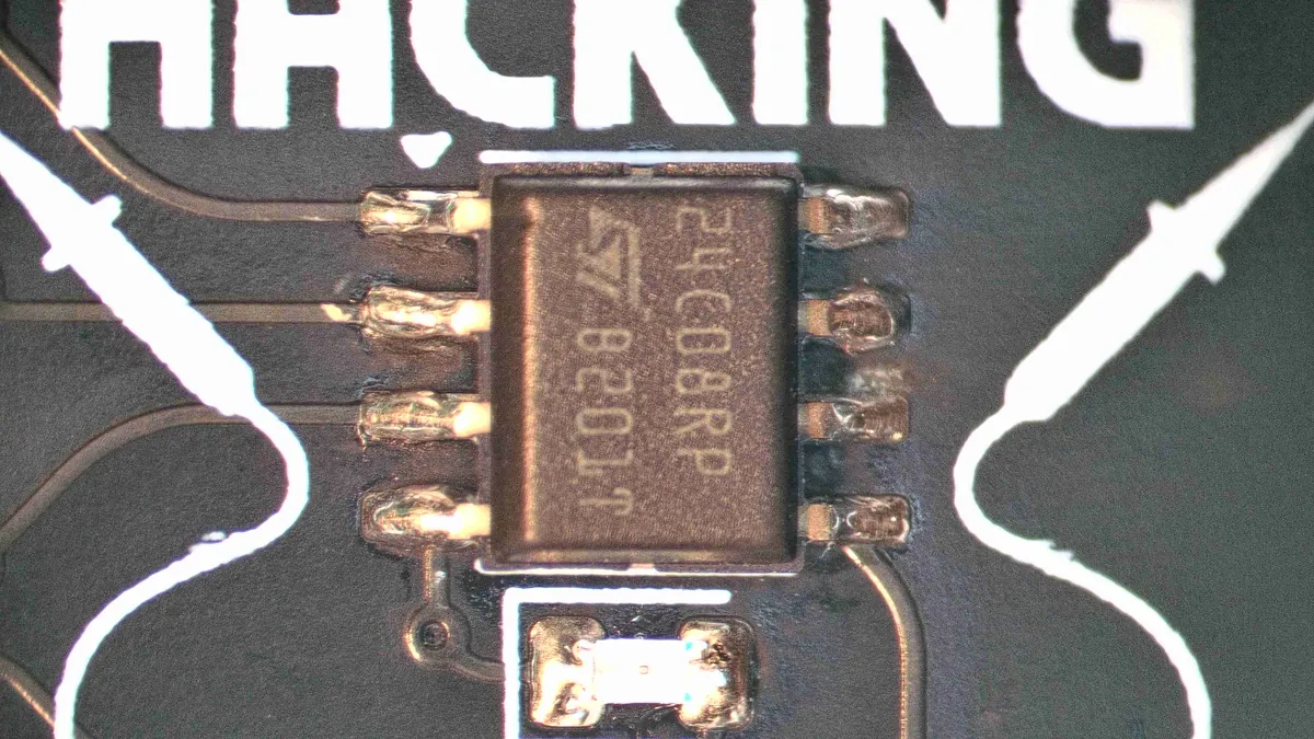 The soldered chip after cleaning: eight separate shiny joints, no bridges